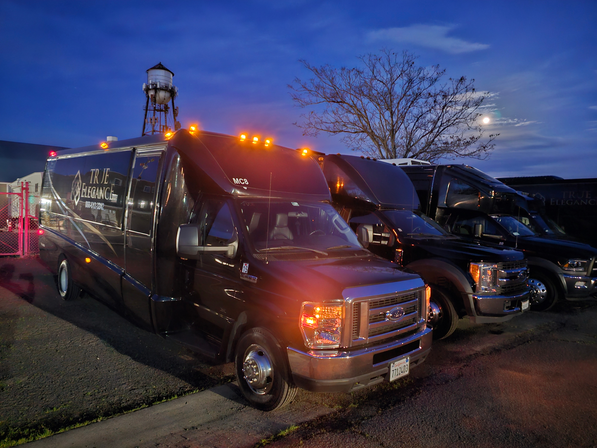 True Elegance motorcoach at dusk in Napa Valley